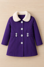Purple coat with white collar and buttons on a beige background